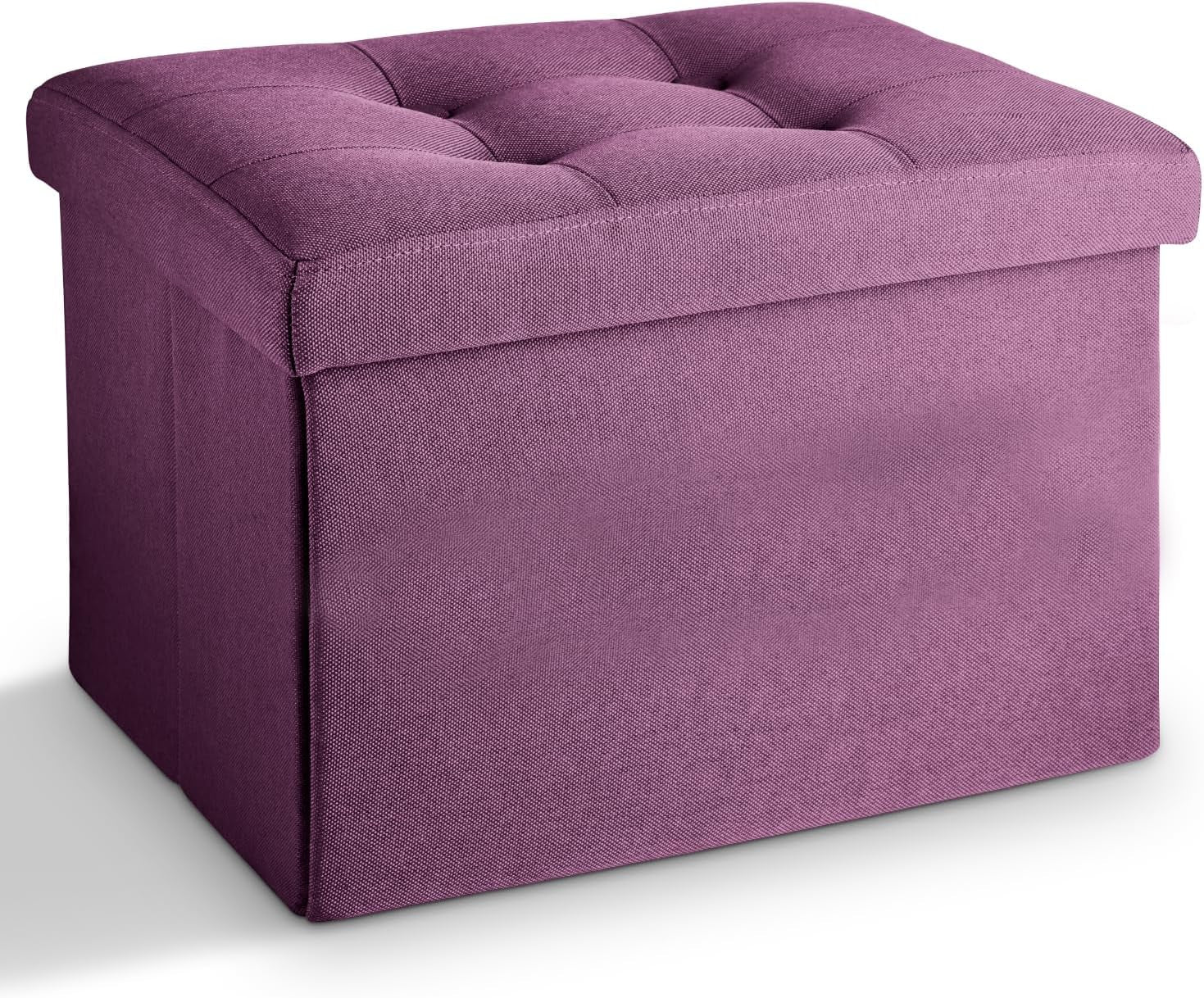 Three-quarter front view of a tufted purple fabric storage ottoman on a white background.