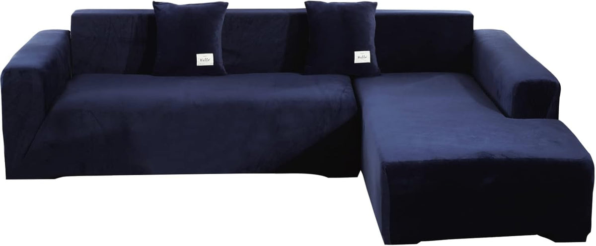 Deep navy velvet L-shaped slipcover front view showing chaise on the right and two matching pillows