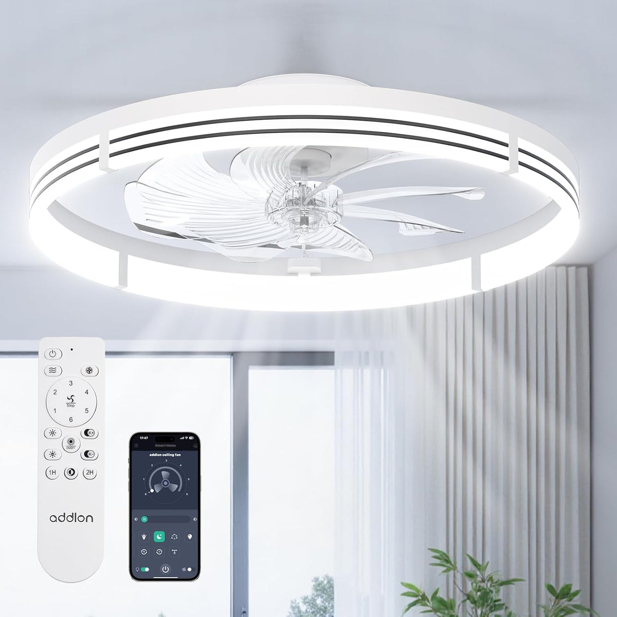 White flush-mount fan with clear curved blades seen from a three-quarter underside angle, remote and phone pictured.