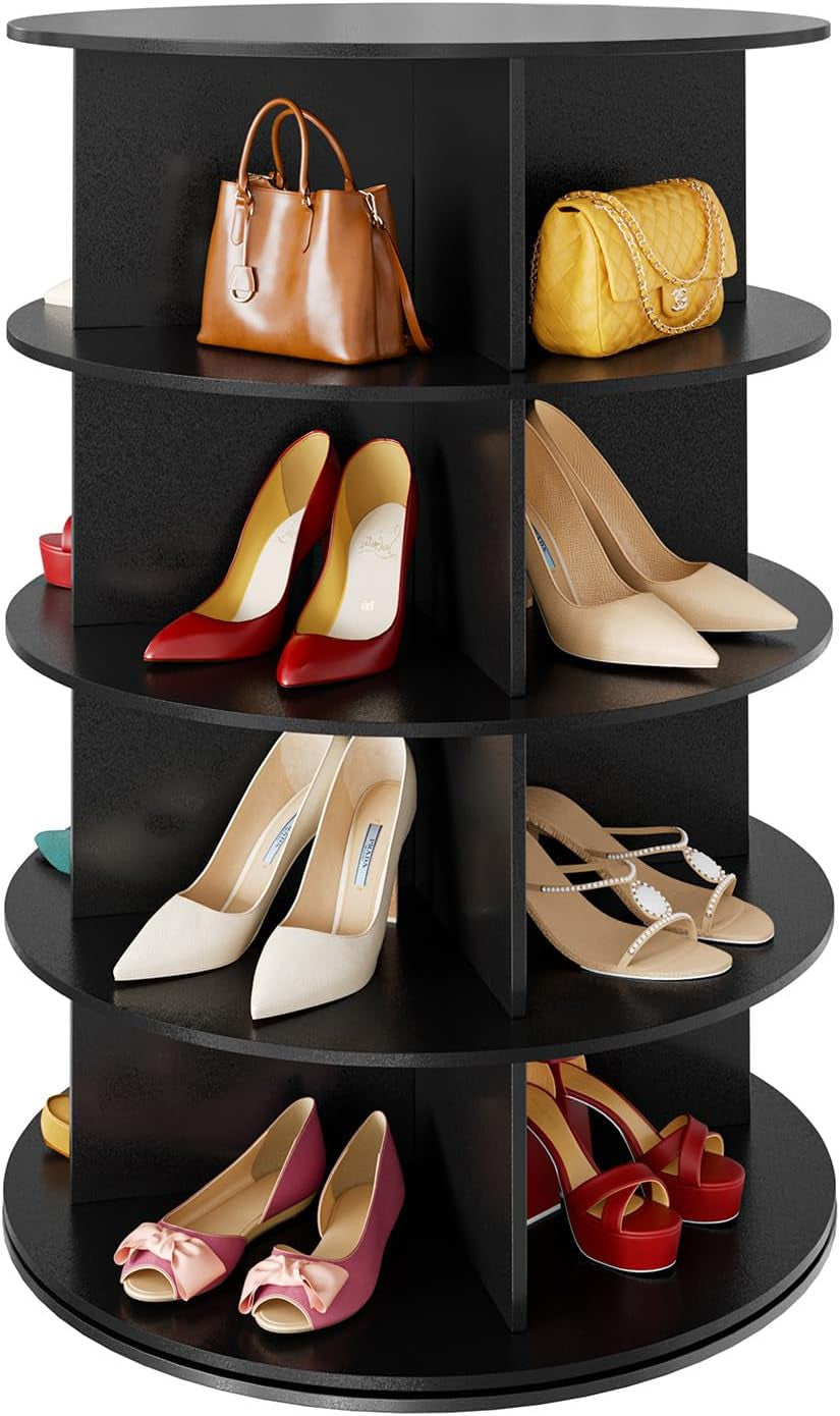 Close crop of middle tiers of a black rotating shoe tower showing compartments with bags and heels.