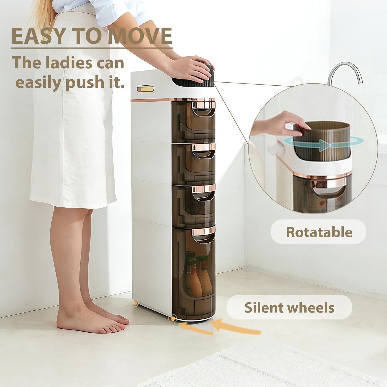 Slim white storage cabinet on small casters being pushed by a person, front view showing top handle and wheels