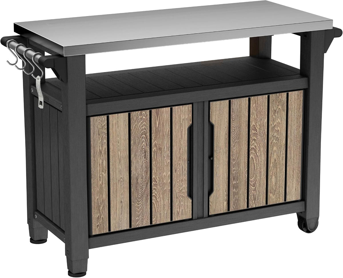 Three-quarter product shot of outdoor storage cart with stainless-steel top, dark frame, wood-look double doors and side