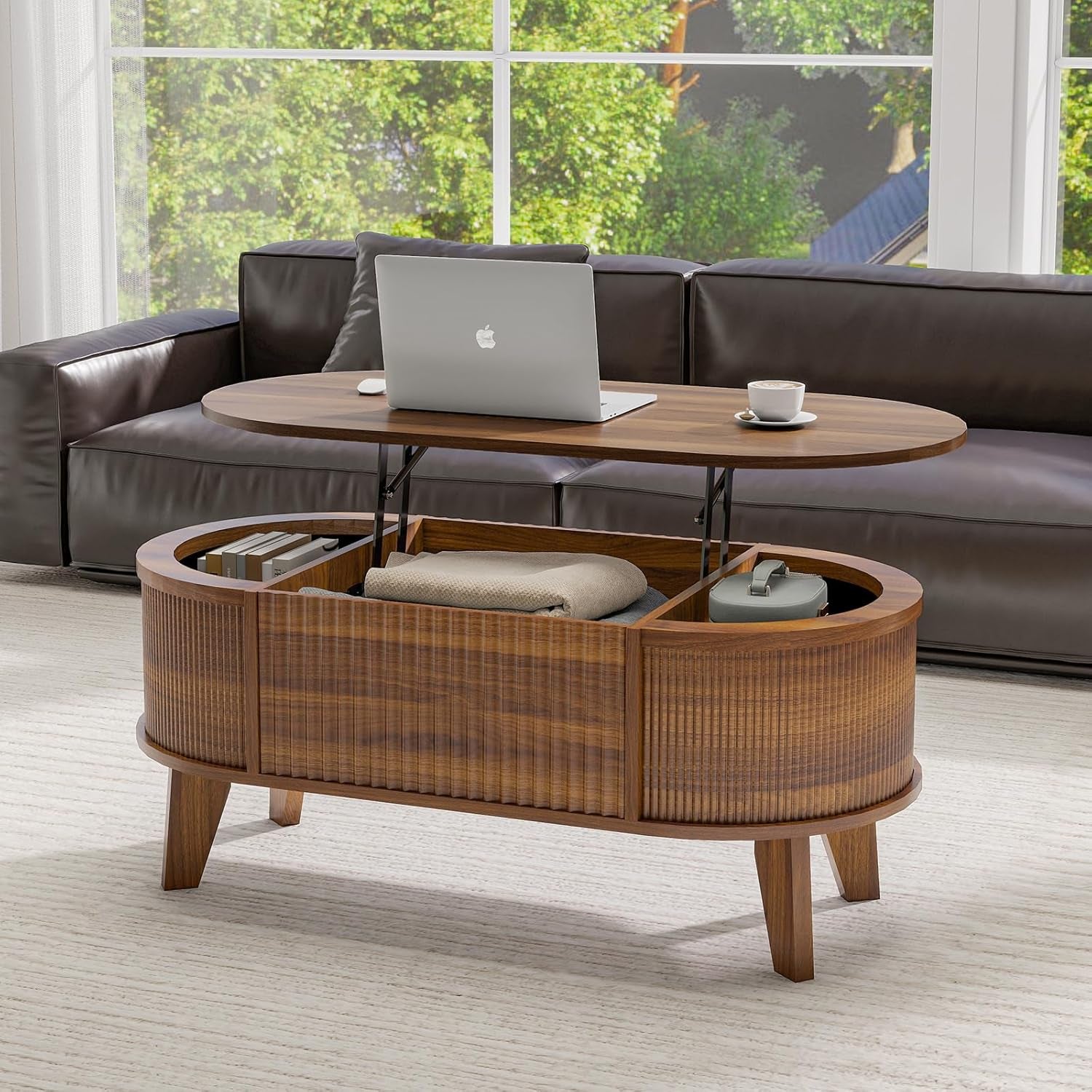 Oval walnut lift-top coffee table open to show divided hidden storage inside