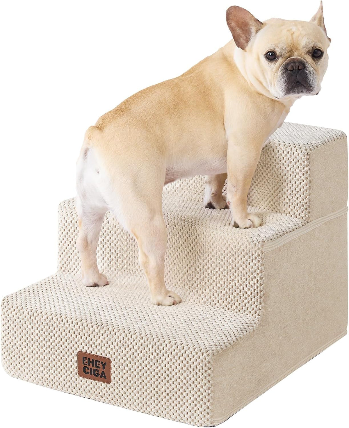 Front-angle view of cream-colored textured pet stairs with a small fawn French bulldog near the top step