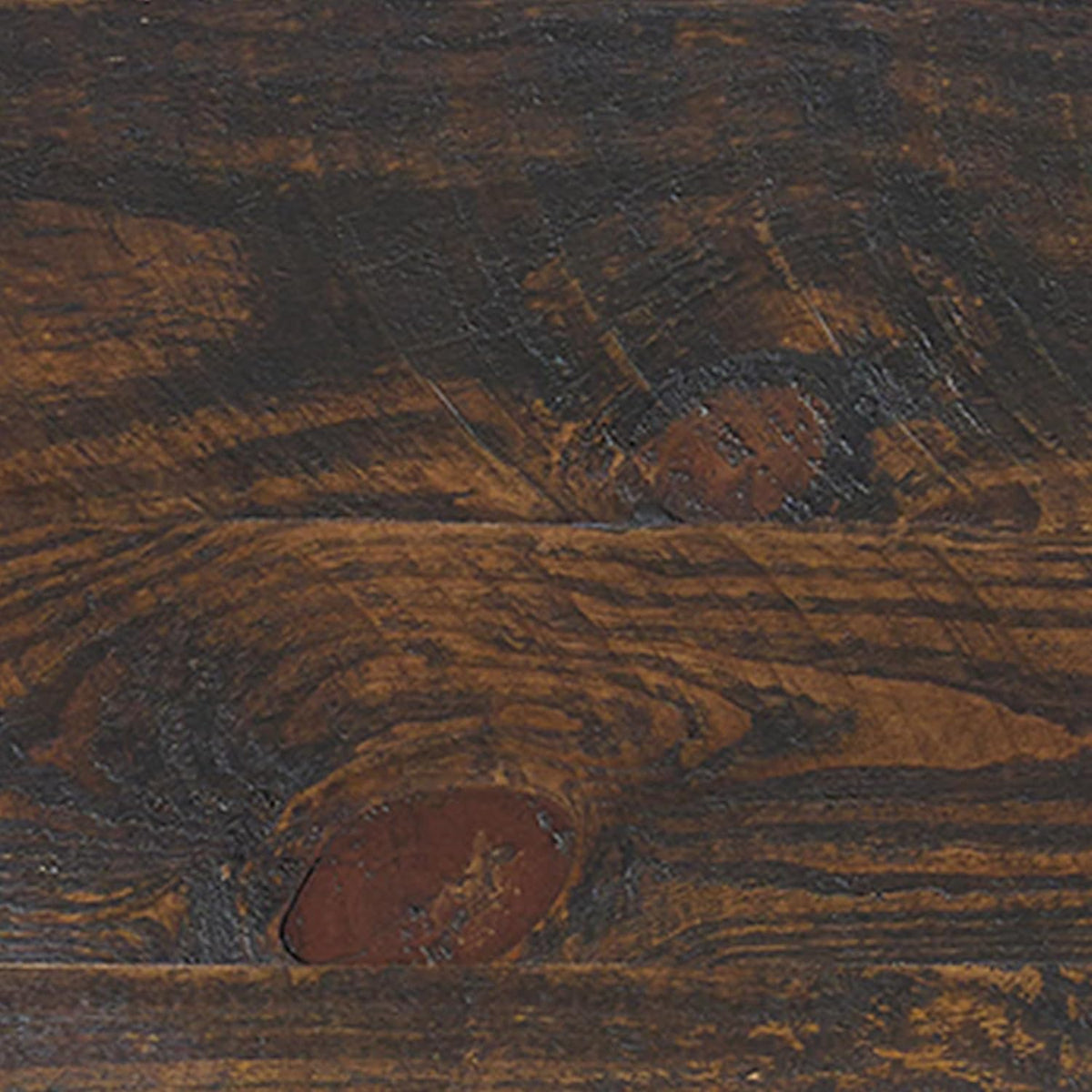 Close-up of the wood surface showing knots, grain patterns, and a distressed finish.