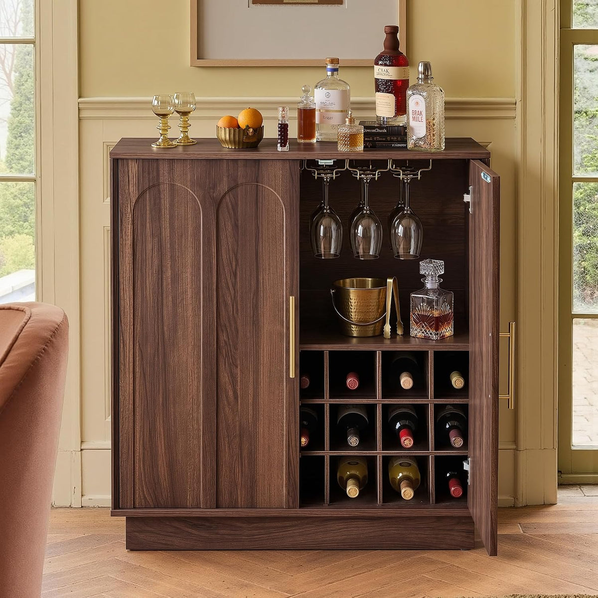 Walnut wine bar cabinet with right door open showing 21-bottle grid and hanging stemware rack