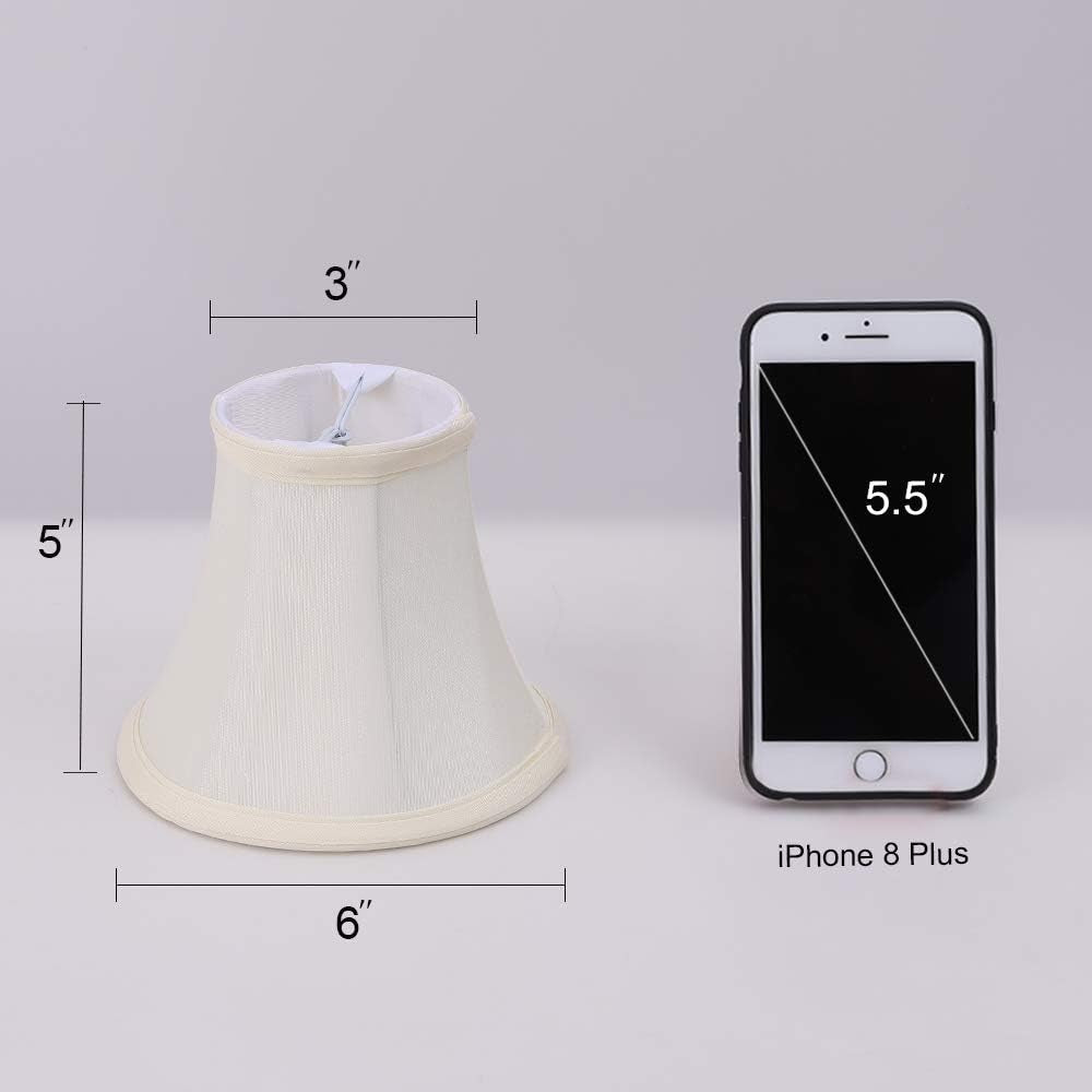 Single cream bell shade shown with 3 in top, 6 in bottom and 5 in height beside a phone for scale