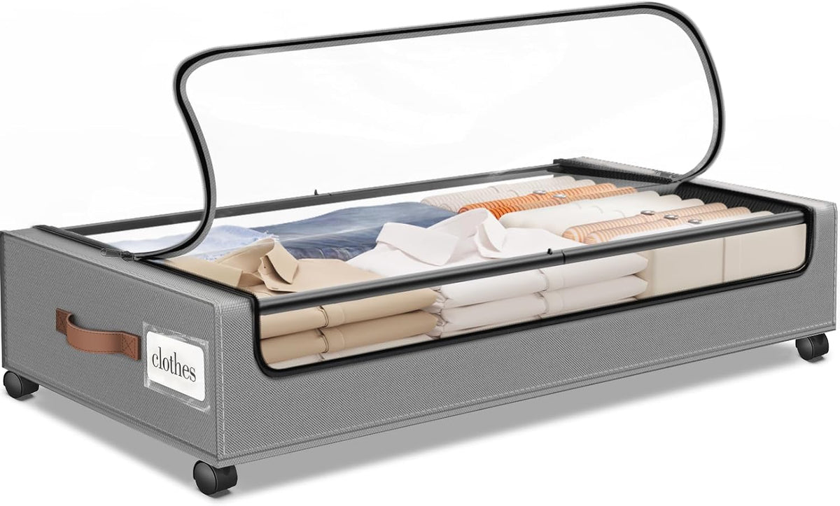 Side-angle view of a gray underbed box with its clear lid unzipped and flipped open, exposing folded garments inside.