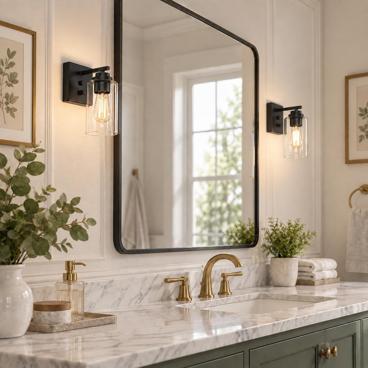 Matte black sconce mounted beside a bathroom mirror above a marble vanity in a styled bathroom