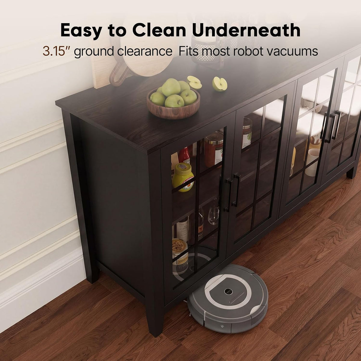 Angled view of the cabinet showing clearance underneath with a robot vacuum positioned beneath to illustrate space
