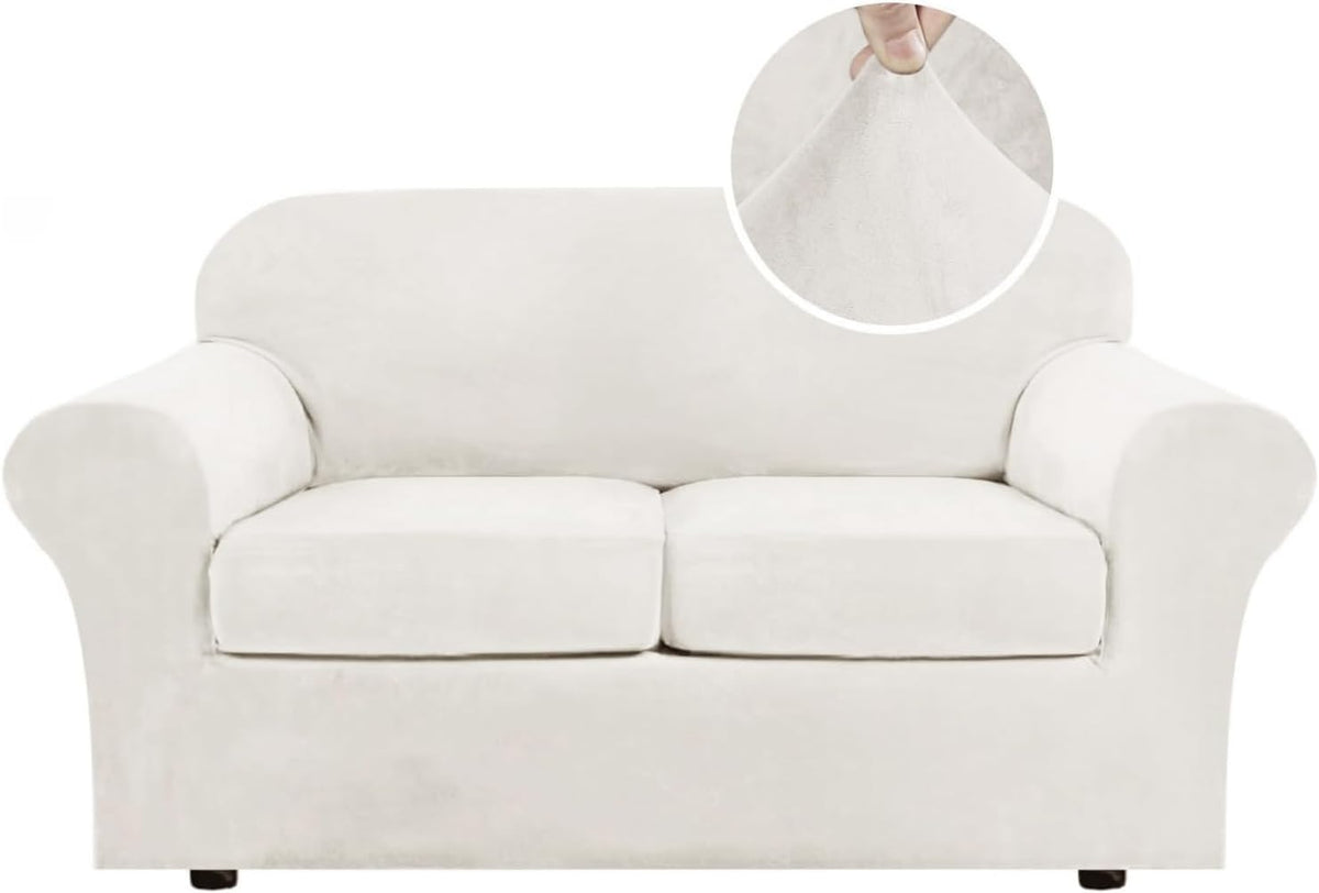 Front-facing two-seat loveseat in clean ivory velvet with rounded arms and separate seat cushions.