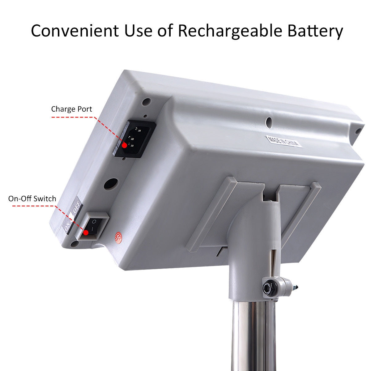 Underside of the display housing showing its charging port and power switch.