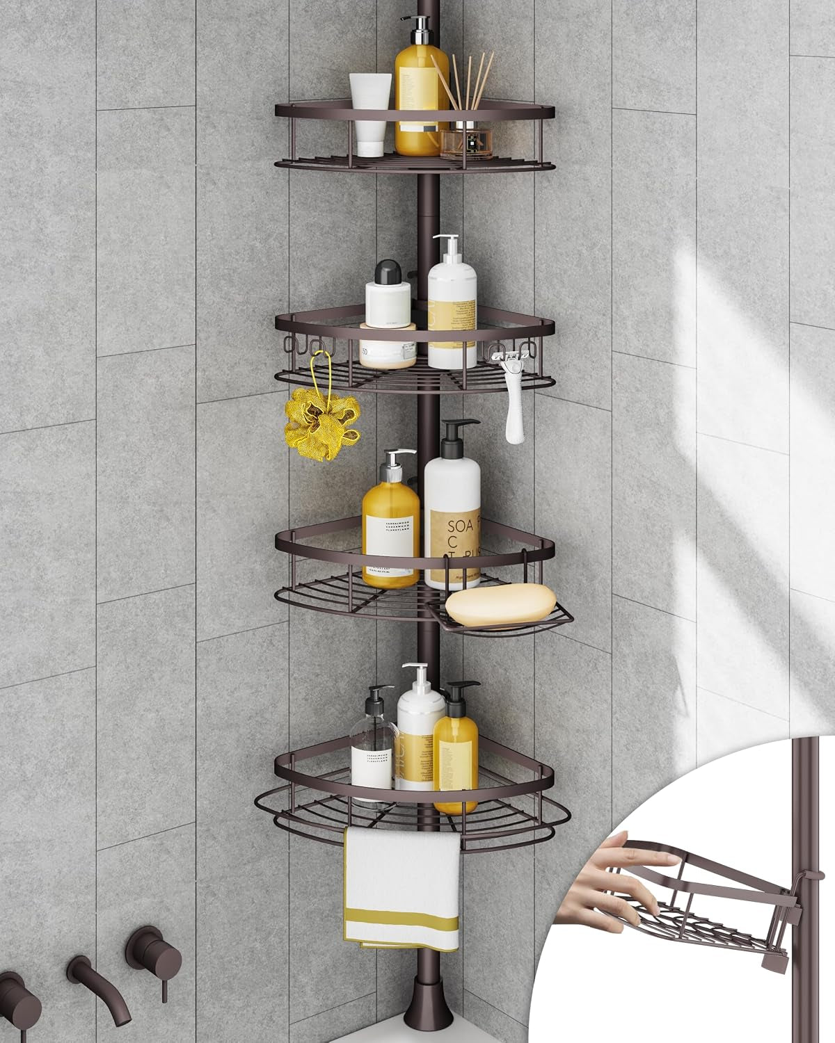 Bronze-finish four-tier tension pole caddy fitted in a gray tiled shower corner holding bottles, loofah and soap.