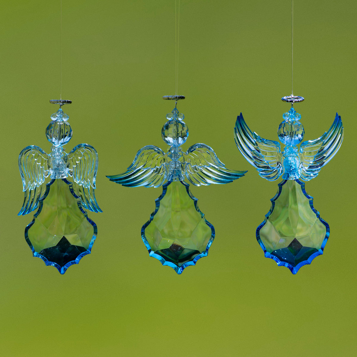 Three blue hanging angel ornaments shown together, each with its wings in a different position.