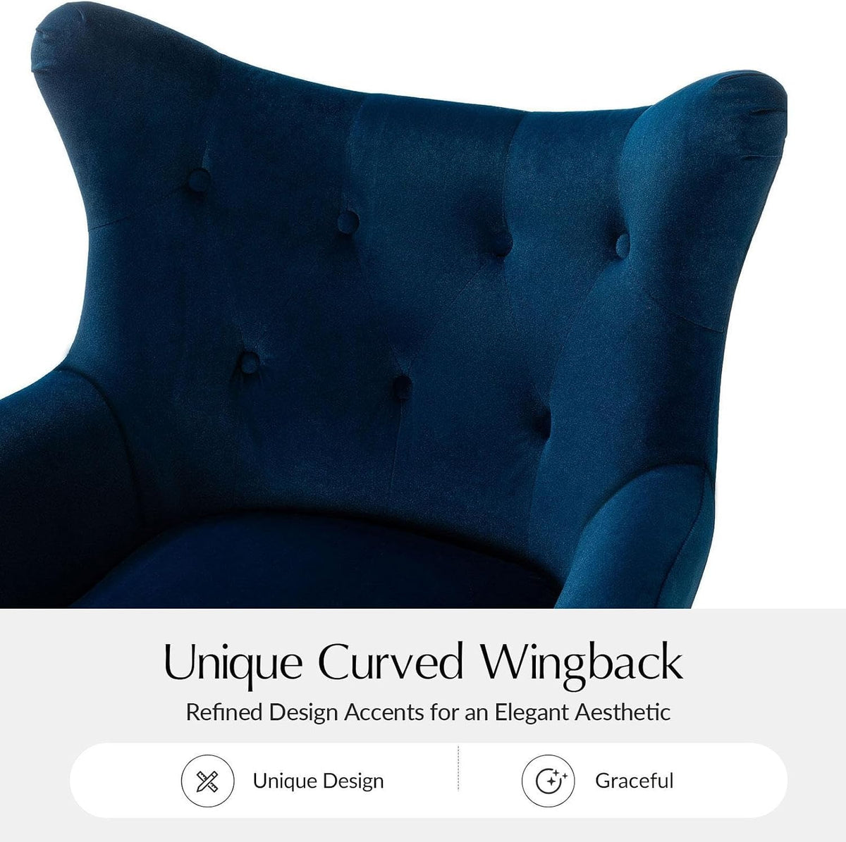 Studio close-up of the tufted upper back of a navy velvet wingback chair showing button details and curved wing silhouette