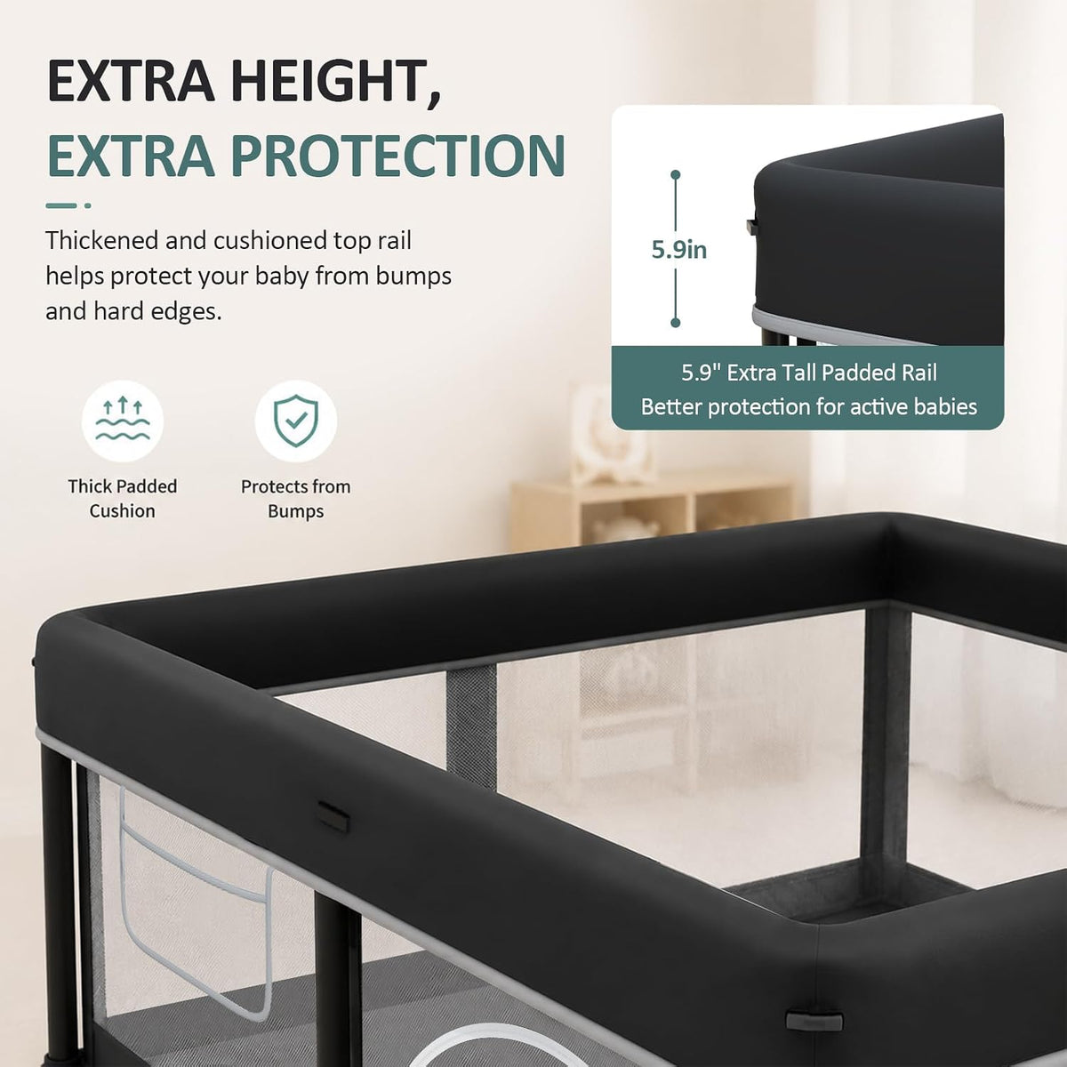 Close-up of the playpen's thick padded black top rail and mesh side panels in a neutral room.