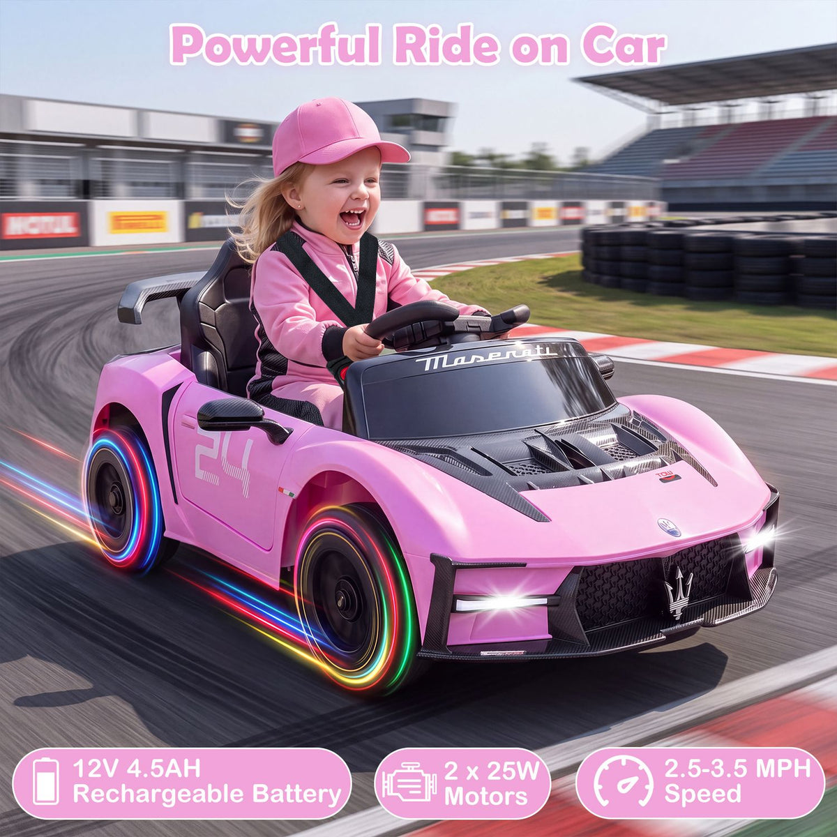 A child drives a pink toy sports car on a racetrack, with colored lights around the wheels.