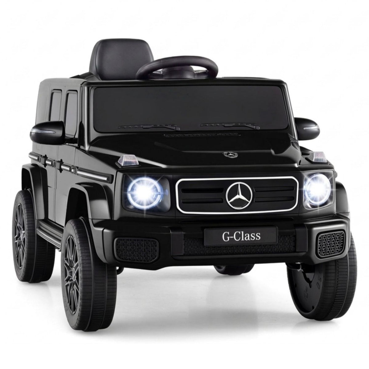 A black miniature SUV shown alone against a white background, with its headlights illuminated.
