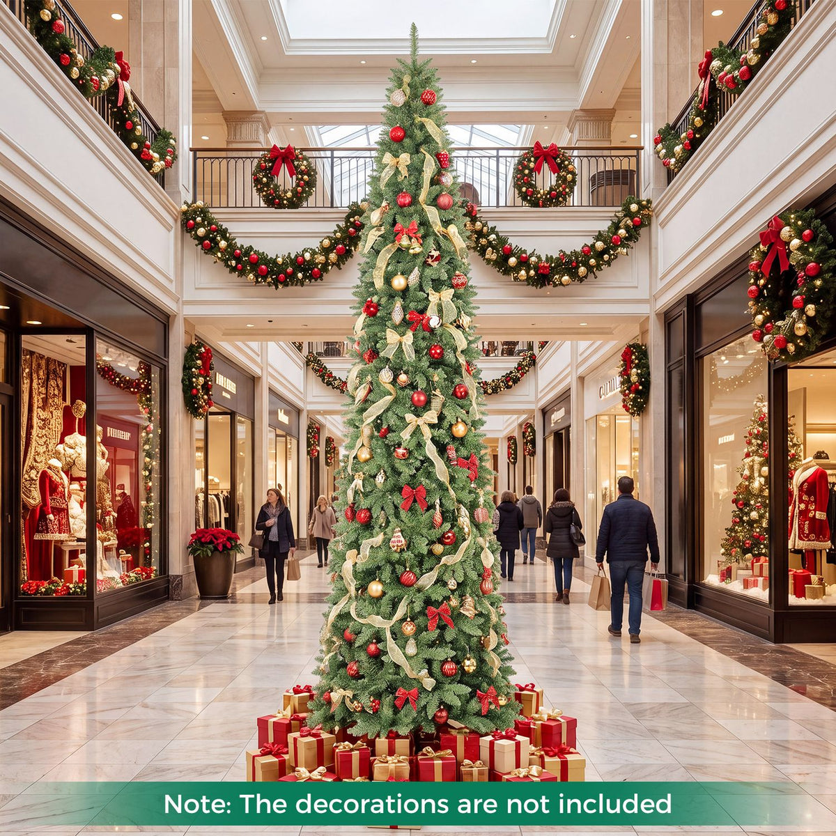 Ornamented Christmas tree surrounded by gifts in a brightly lit shopping mall.