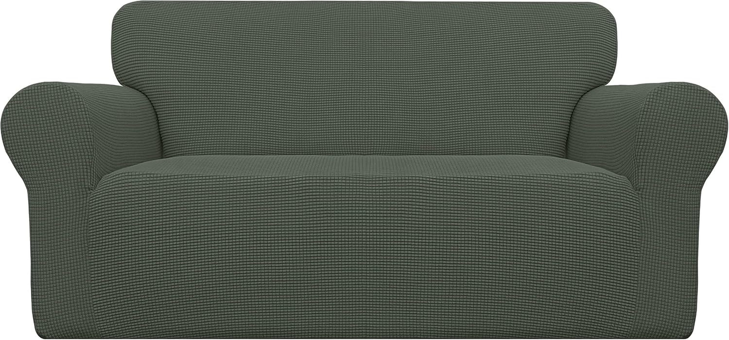 Head-on, tightly cropped dark gray loveseat cover showing rounded arms and subtle horizontal waffle texture