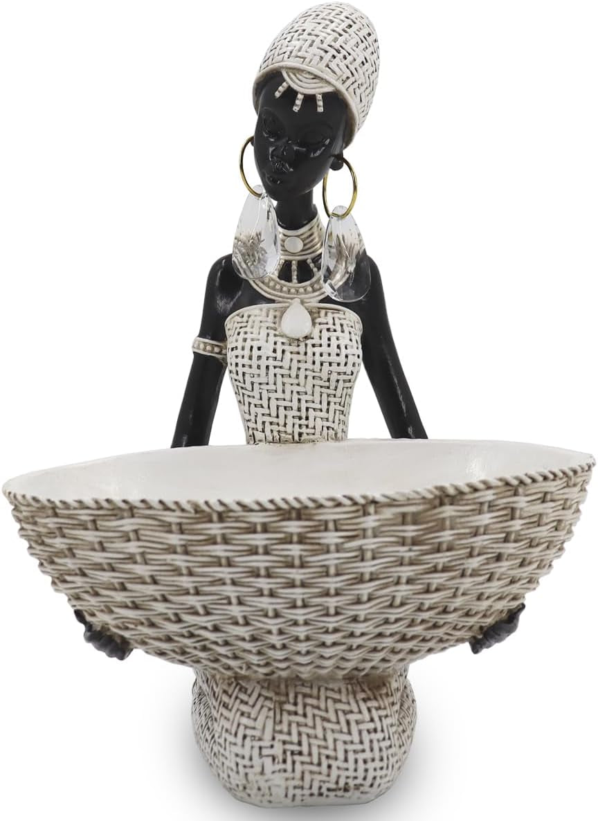 Front view of a black female figurine holding a large woven white bowl tray