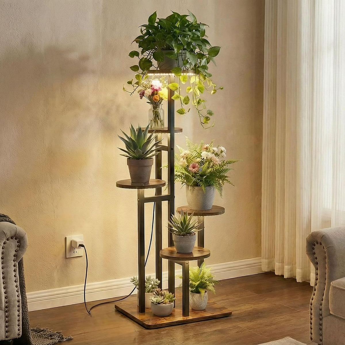 Full-height shot of the lit plant stand against a textured wall, LED light casting plant shadows onto the wall and floor