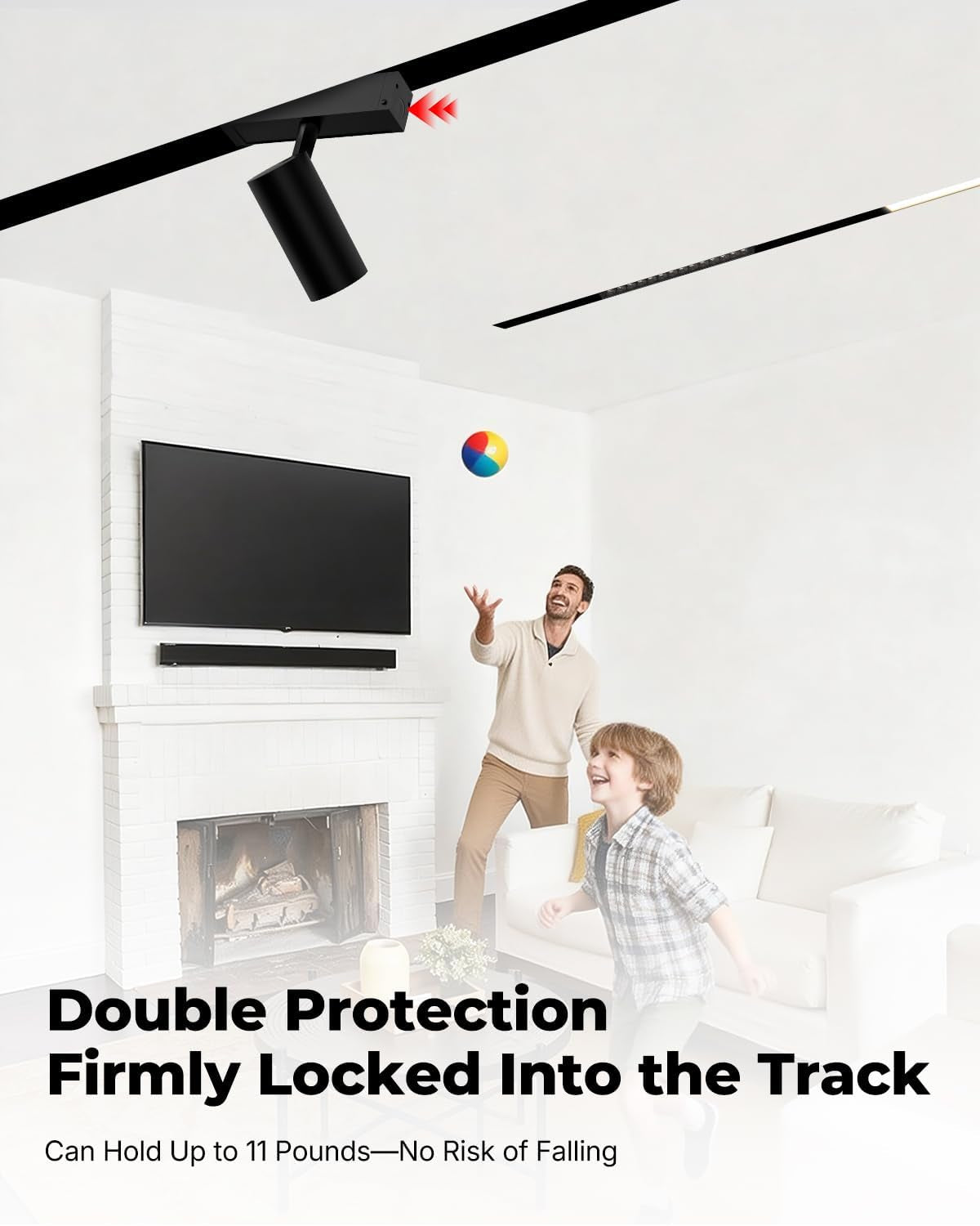 Ceiling-mounted black spotlight snapped into a magnetic recessed track above a father and child in a living room