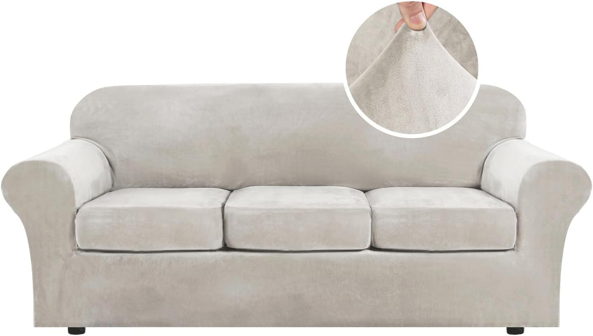 Front-facing three-cushion sofa in light gray with round inset showing the plush velvet texture.