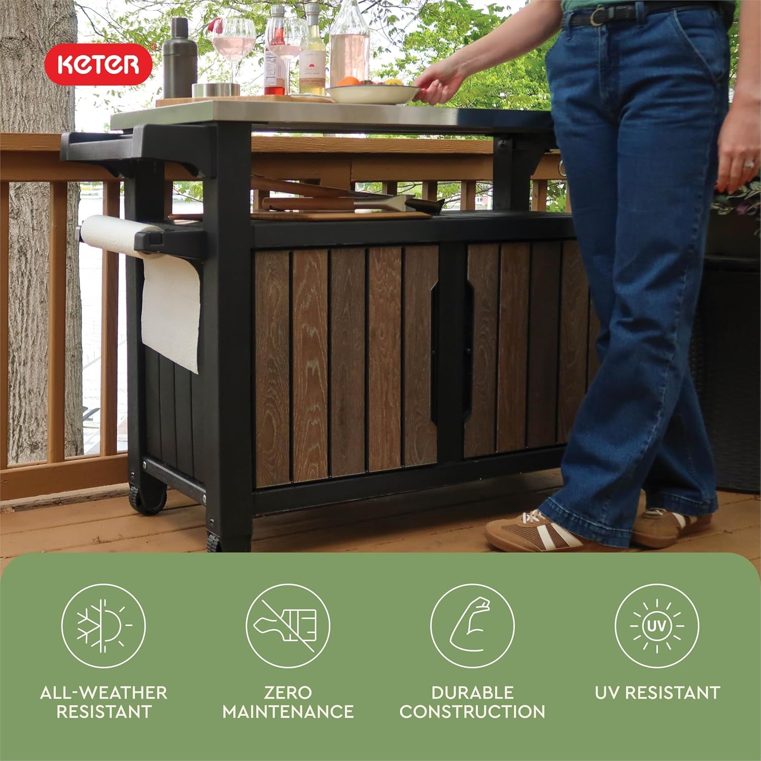 Side view of the outdoor station in use on a deck showing towel holder and countertop items with person standing
