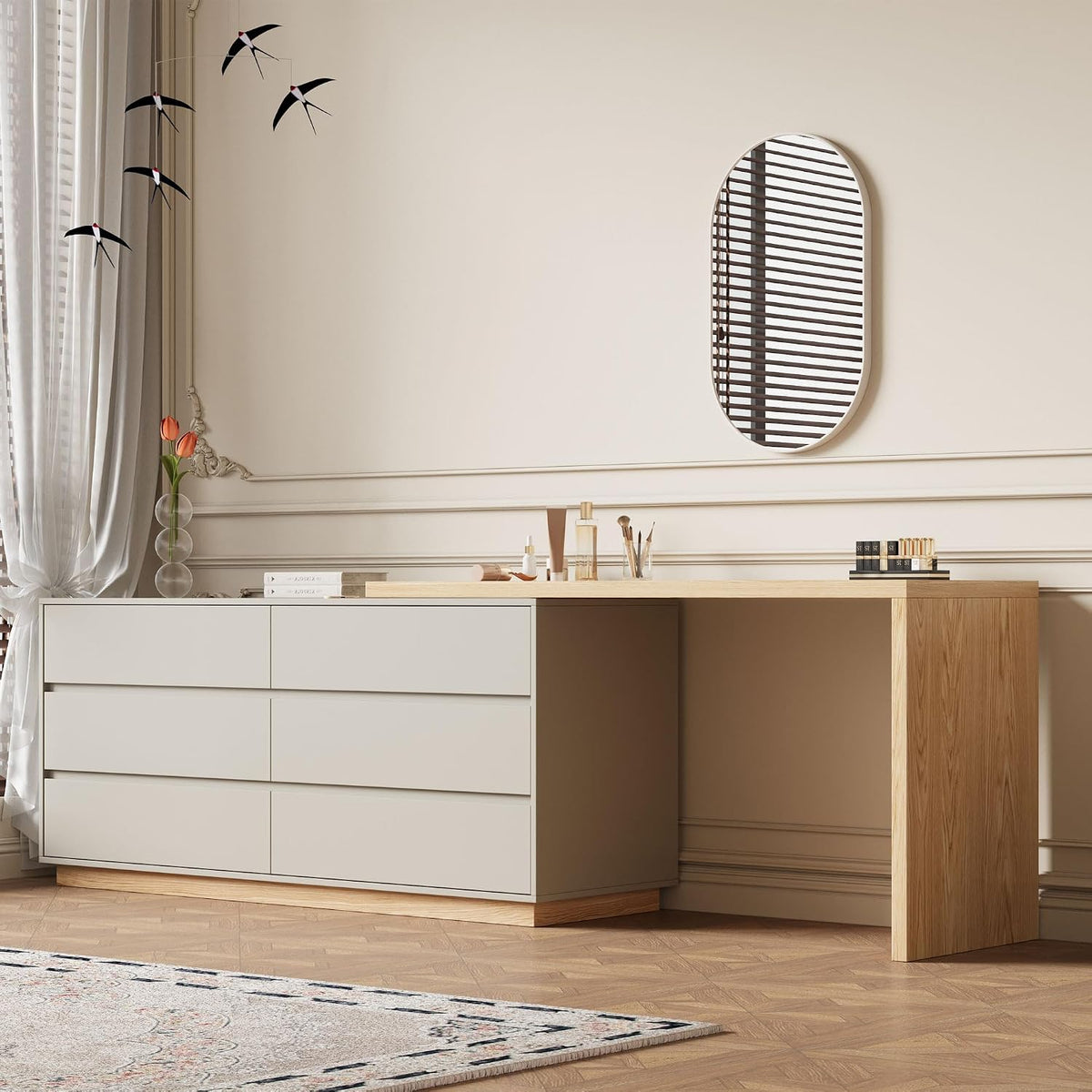 Light beige six-drawer dresser with attached wood desktop in a styled room with mirror and curtains.