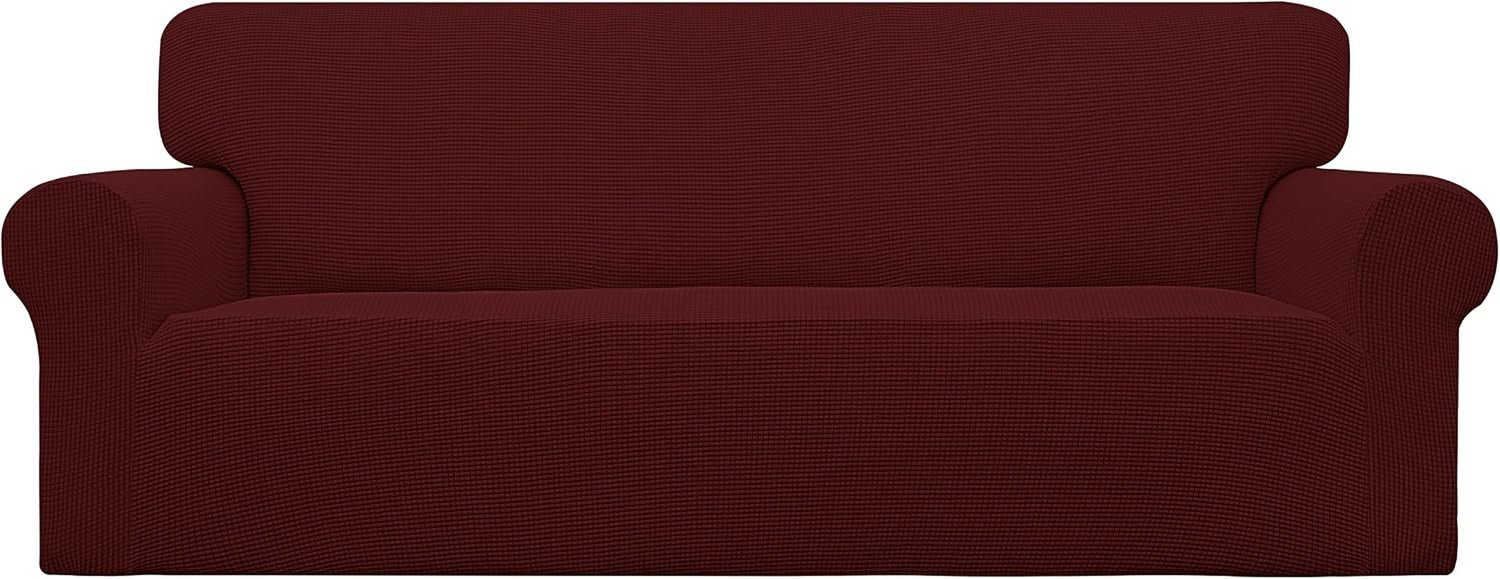 Front view of a two-cushion loveseat draped in a deep burgundy textured slipcover