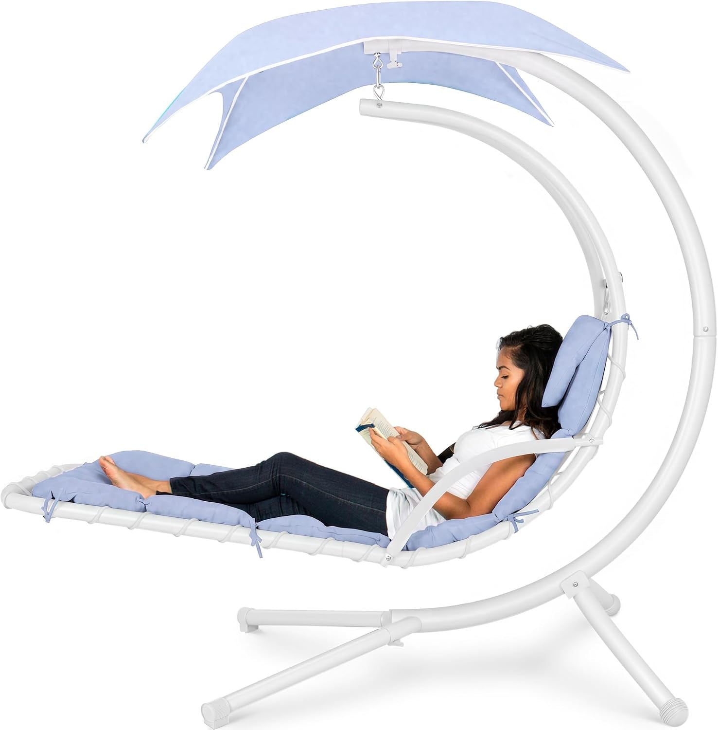 Curved hanging chaise with light blue cushions and white frame, model reading while lounging under matching canopy.