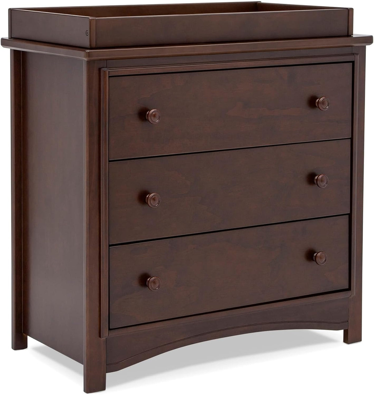 Three-quarter front view of walnut-finish three-drawer dresser with curved base and round wood knobs.