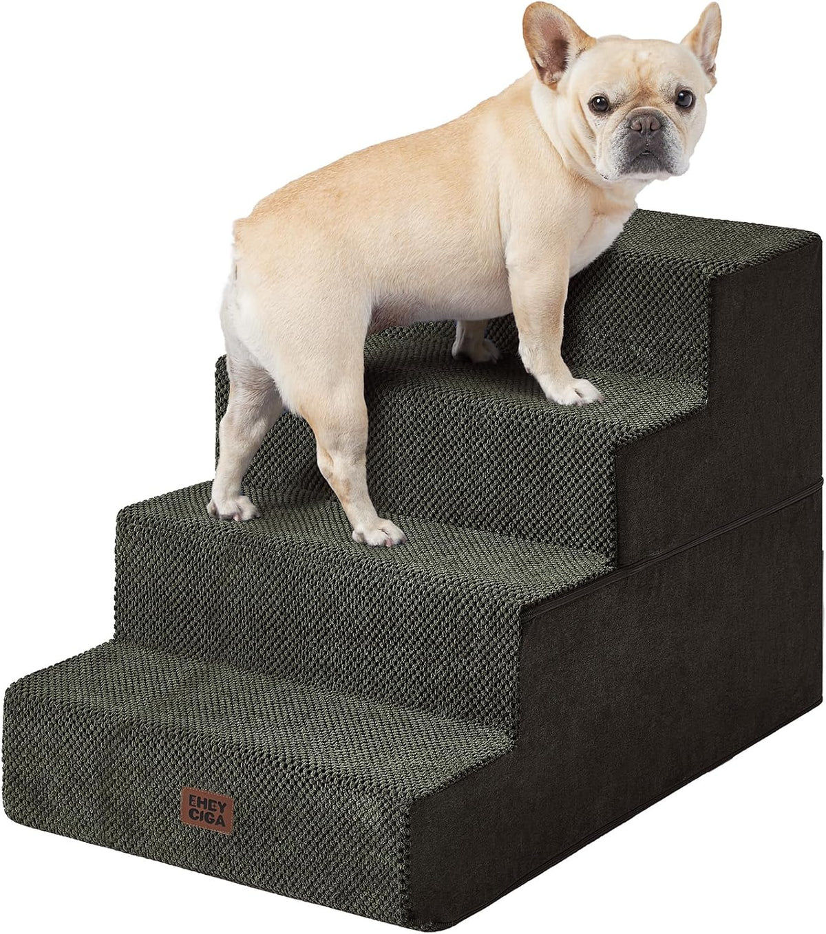 Beige French bulldog standing on dark charcoal four-step pet stairs with textured fabric cover