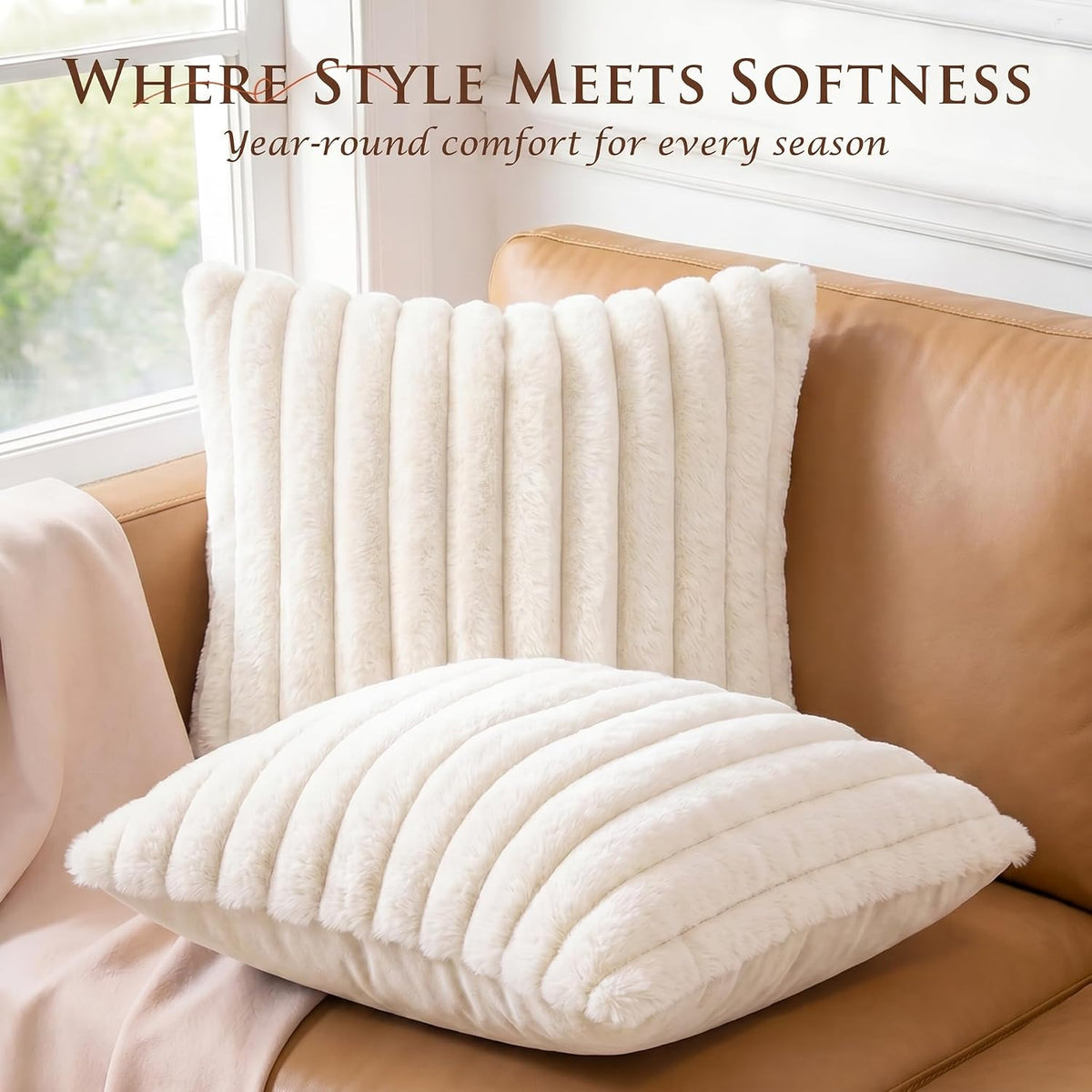 Cream ribbed faux-fur pillow and matching throw arranged on a tan leather sofa showing front and back textures