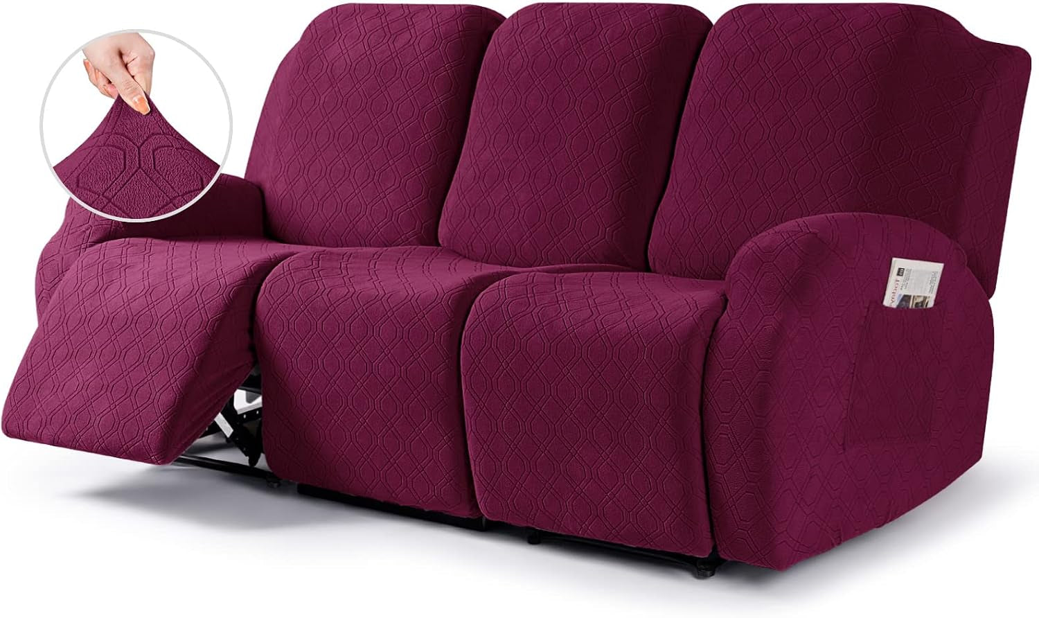 Three-seat reclining sofa covered in textured burgundy slipcover with left footrest extended and arm pocket visible.