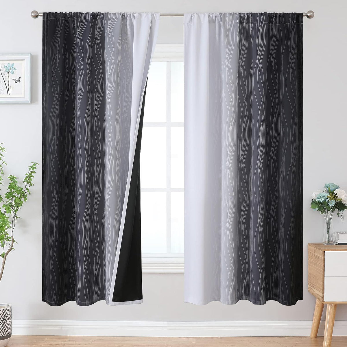 Window with charcoal-to-white ombre curtains featuring vertical wavy lines and one panel slightly opened