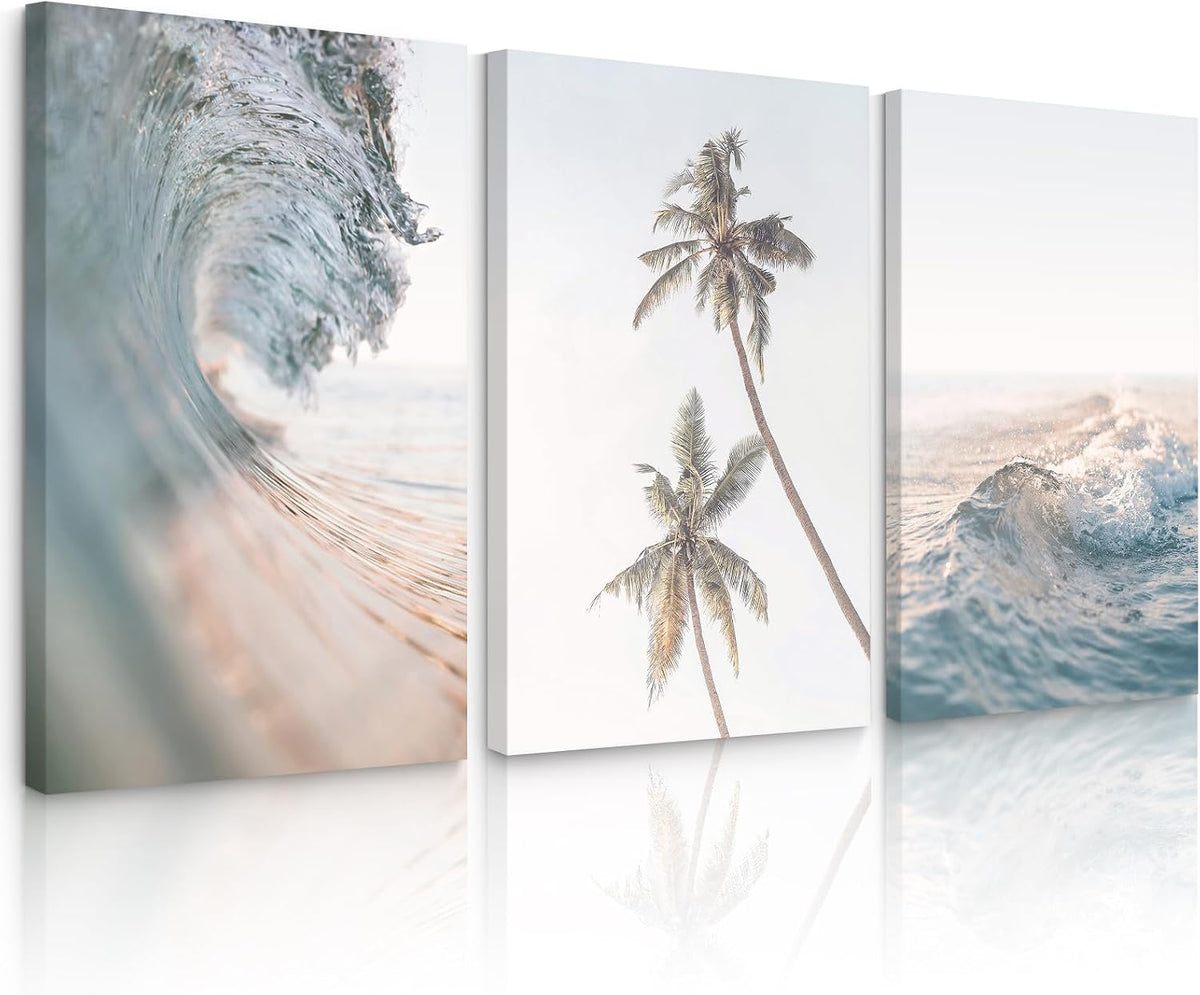 Triptych printed canvases with wrap edges displayed at a slight angle: wave close-up, palms, and ocean wave.