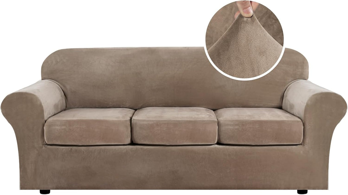 Front-facing three-seat sofa in warm beige showing short black legs peeking beneath the skirt and a round fabric sample