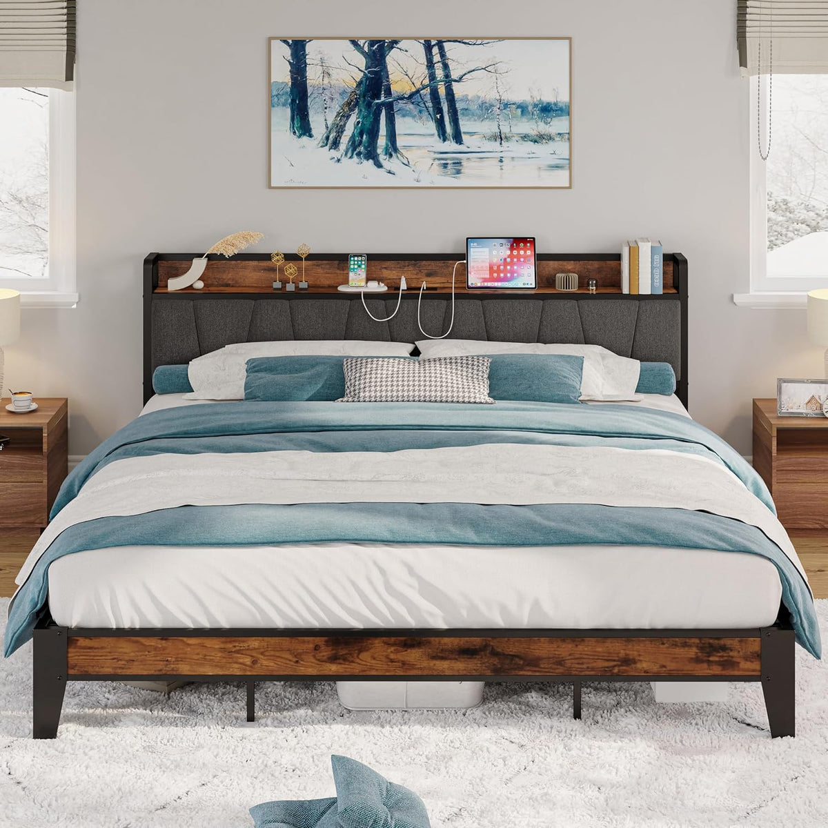Straight-on view of the platform bed showing gray tufted headboard and reclaimed-look wood footboard in a bright room.
