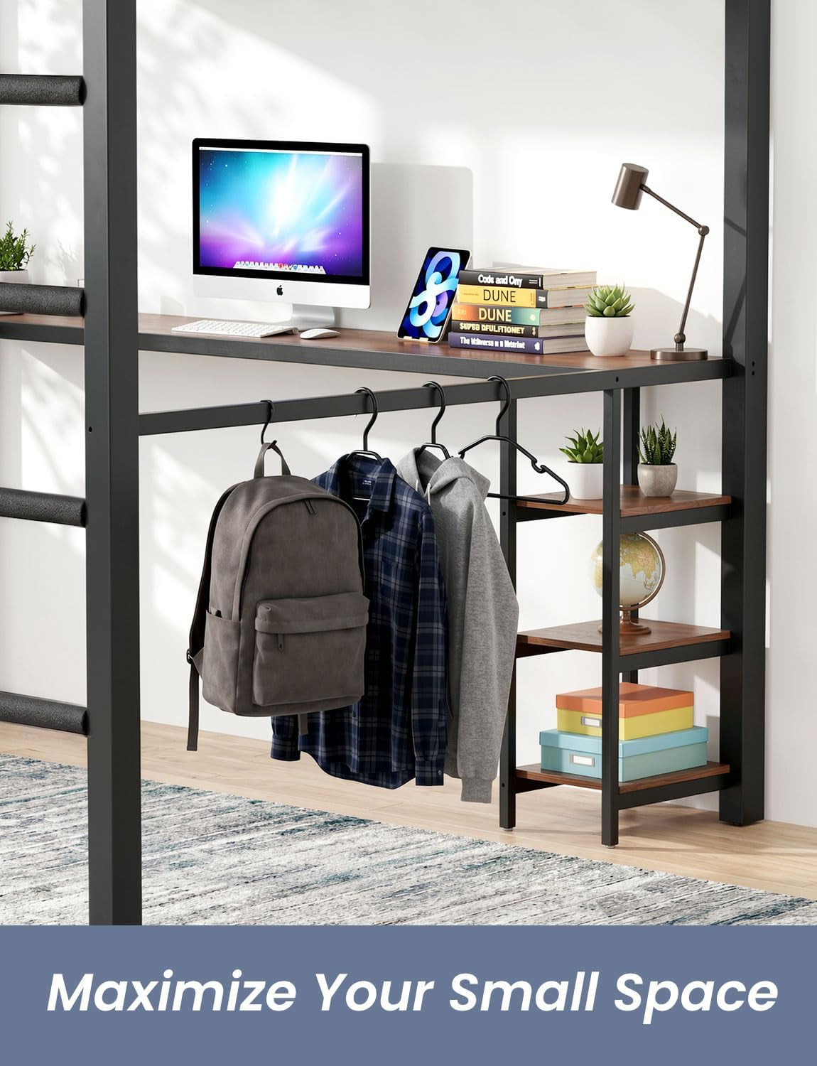 Side view of loft desk with a hanging rail holding a backpack and shirts, laptop on the desktop and stacked shelves at the