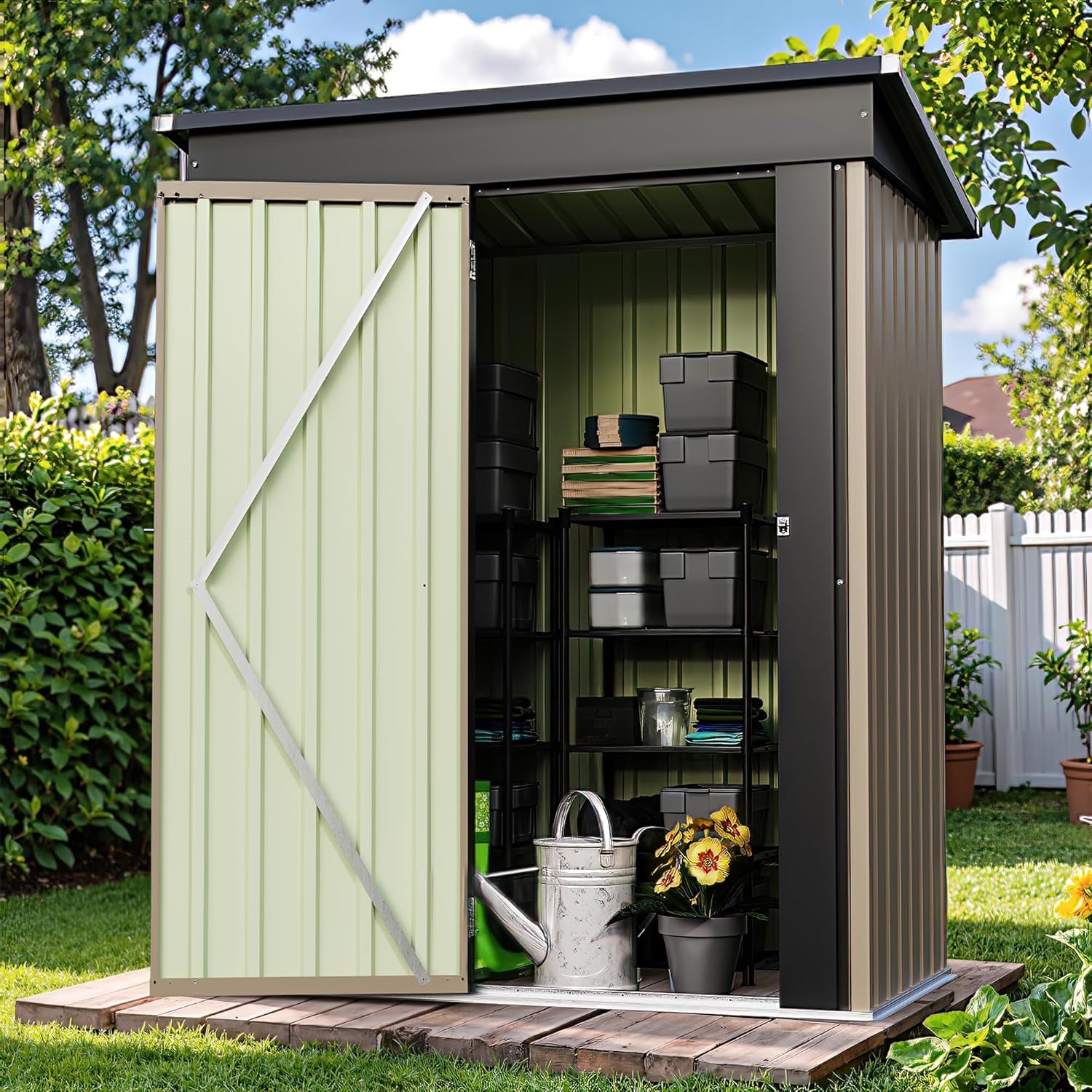 Shed on a wooden platform with the door open, showing shelves of storage bins, a watering can, and potted plants inside