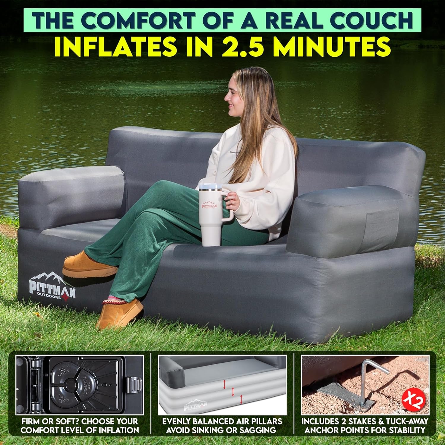 Person seated on gray inflatable couch beside a lake demonstrating outdoor use and seating comfort