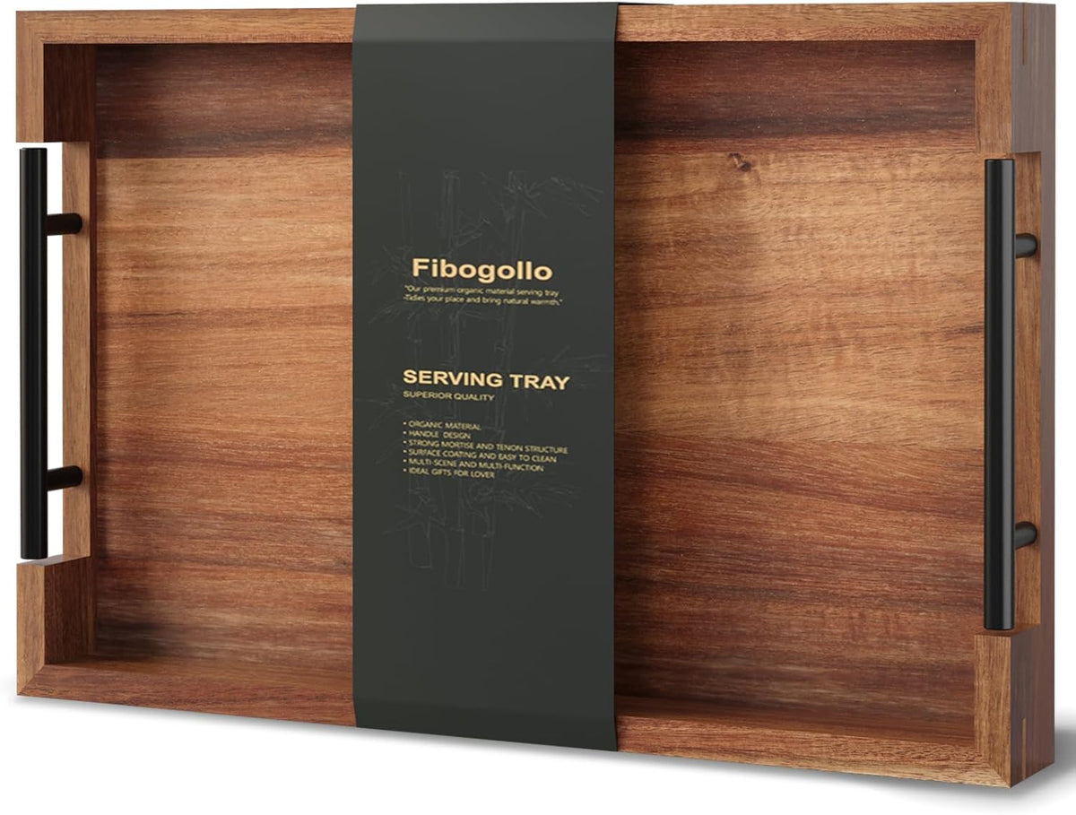 Rectangular brown acacia serving tray with black metal handles and a central packaging band, top view