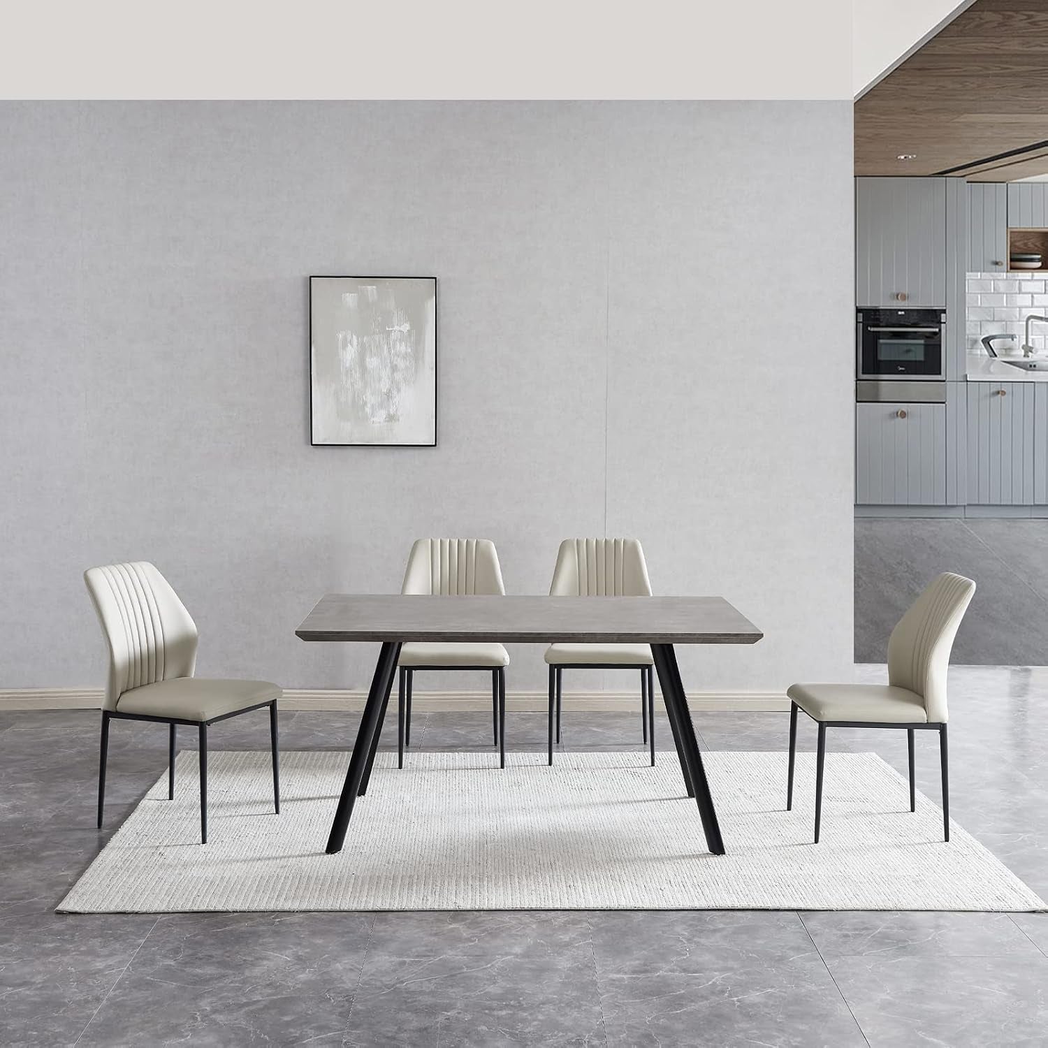 Light beige PU chairs paired with the same rectangular table, shown from the front on a textured rug.
