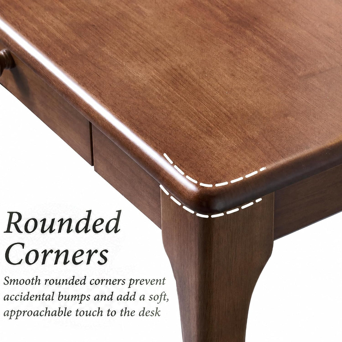 Corner close-up showing smooth rounded corner and contoured leg on the walnut-finish solid wood desk