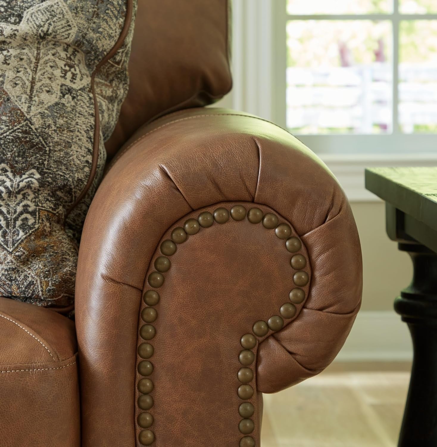 Signature Design by Ashley Carianna Leather Sofa for Living Room, Caramel | Top-Grain Leather Touchpoints, Sag-Resistant Platform Foundation, Classic Rolled Arms with Nailhead Trim