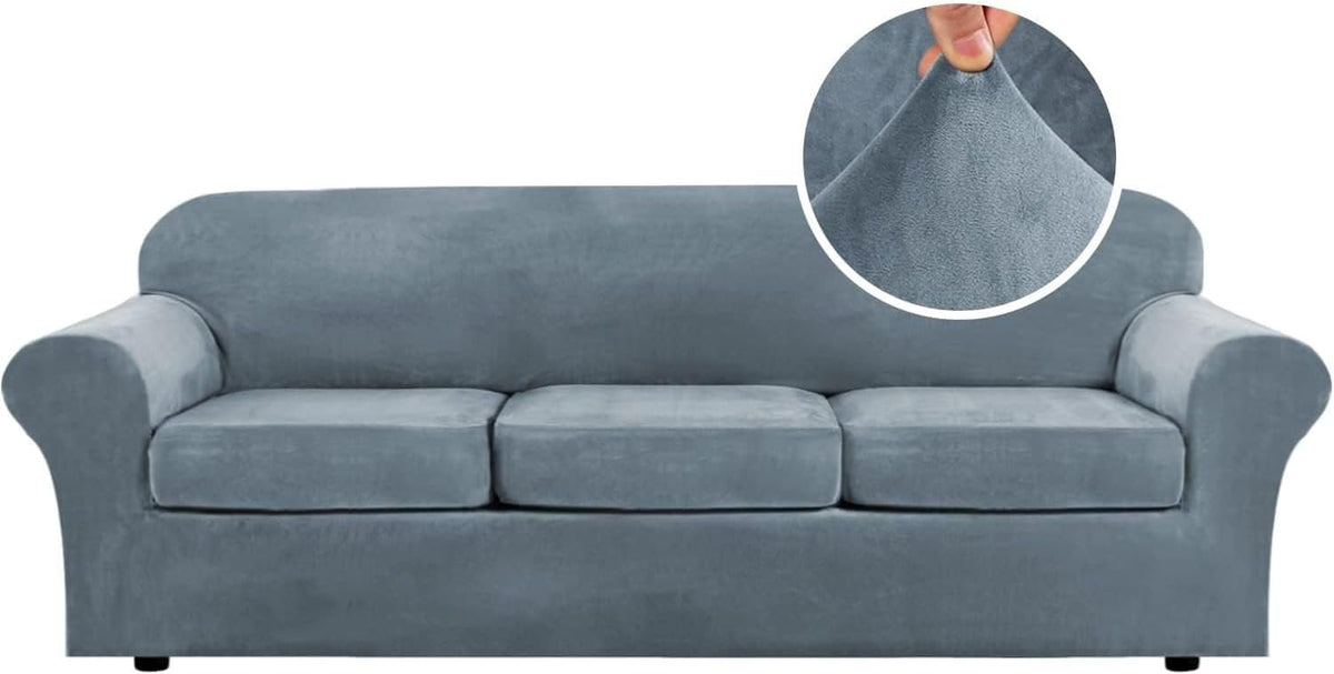 Studio front view of a slate-blue three-seat sofa with rolled arms and short black round feet.