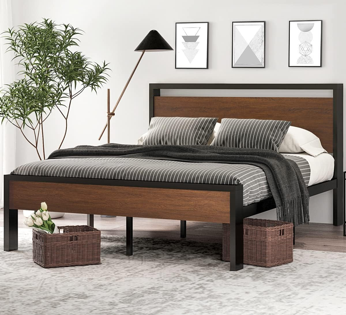 Platform bed with black metal frame and warm brown wooden panels on headboard and footboard