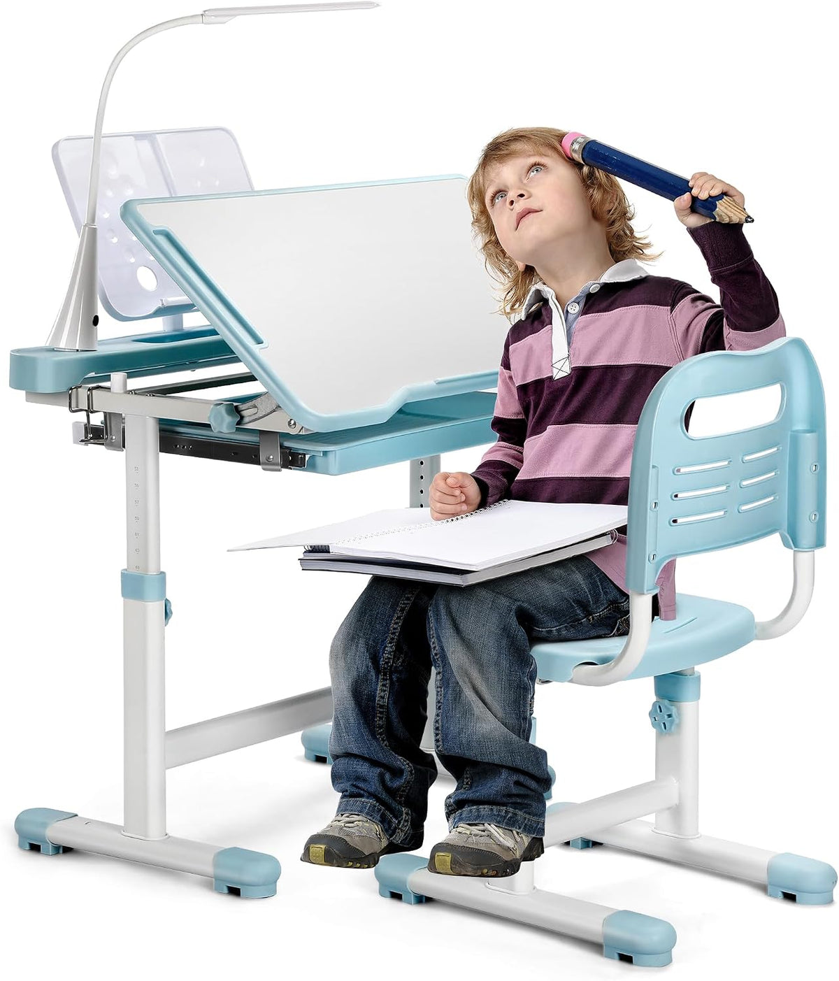 Front three-quarter view of a blue kids desk and chair with a child seated and the desk tilted, lamp attached